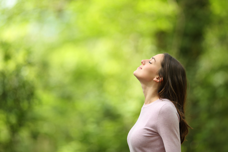 Woman at peace outside