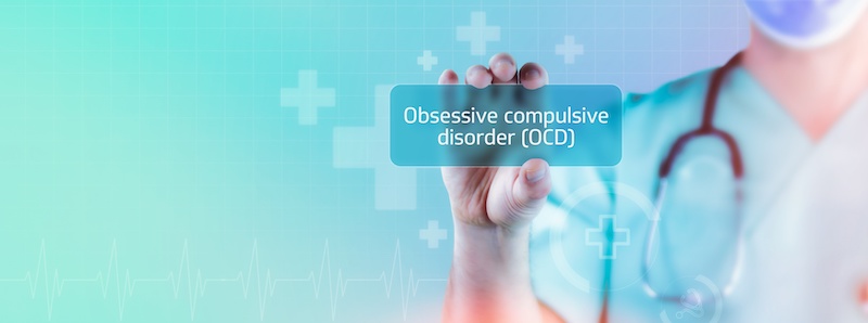 Obsessive compulsive disorder (OCD). Doctor holds virtual card in hand.
