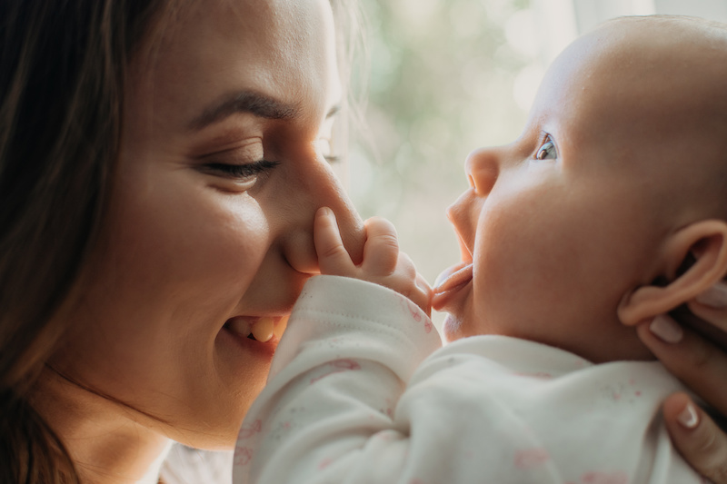 Mental Health in Postpartum Time. Maternal Mental Health. How to avoid pregnancy And Postpartum Disorders, postpartum baby blues, depression. Portrait of happy mother and newborn baby.