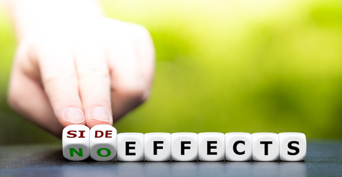 cubes spelling out the term "side effects", with the first two also showing the letters "no"