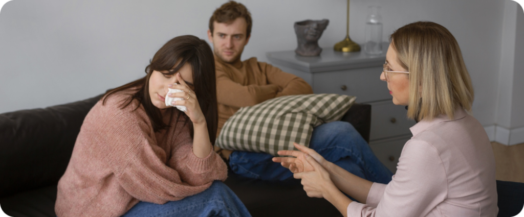Therapist counseling distressed couple