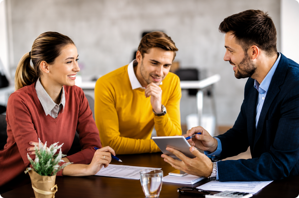 Three colleagues discussing in office