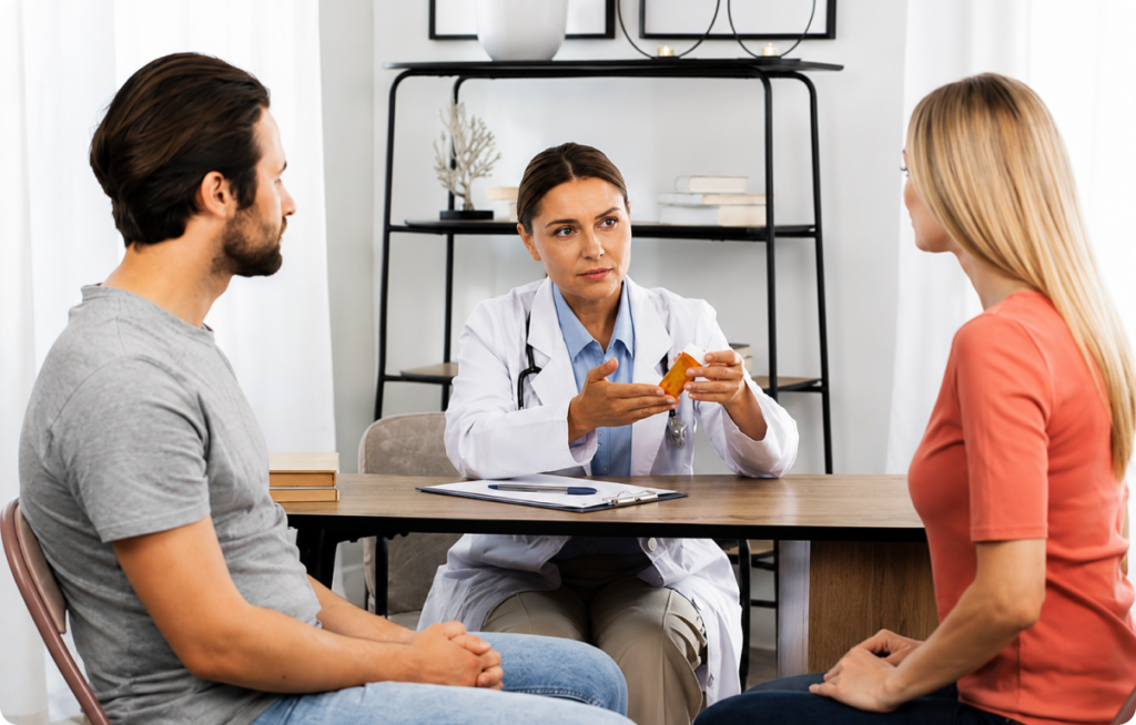 Doctor consulting with a couple