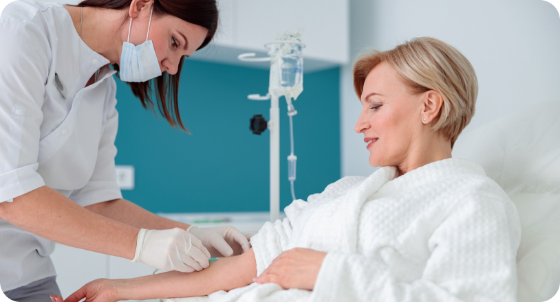 Nurse administering treatment to patient